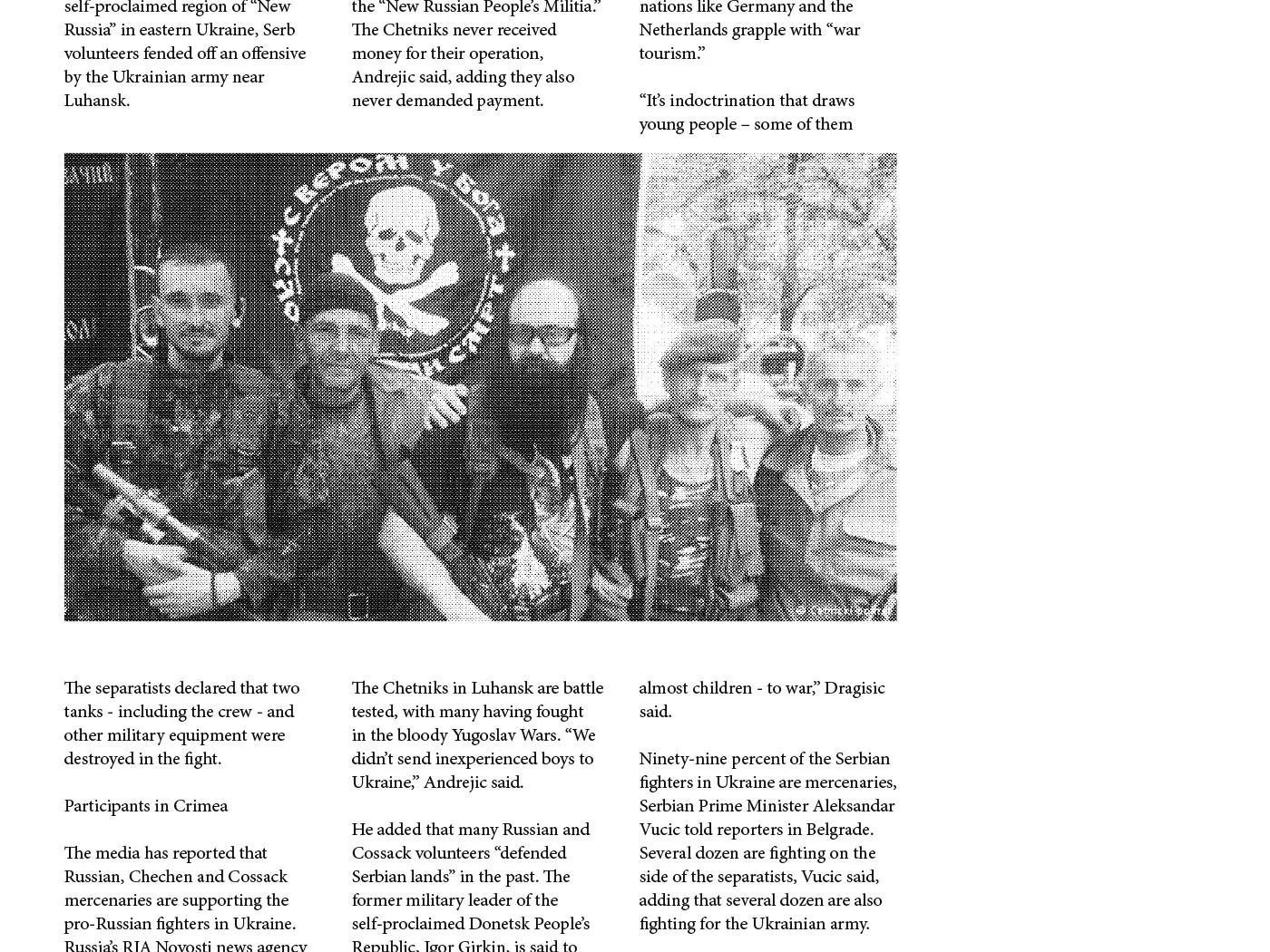 Detail of news articles pasted on monument replica
