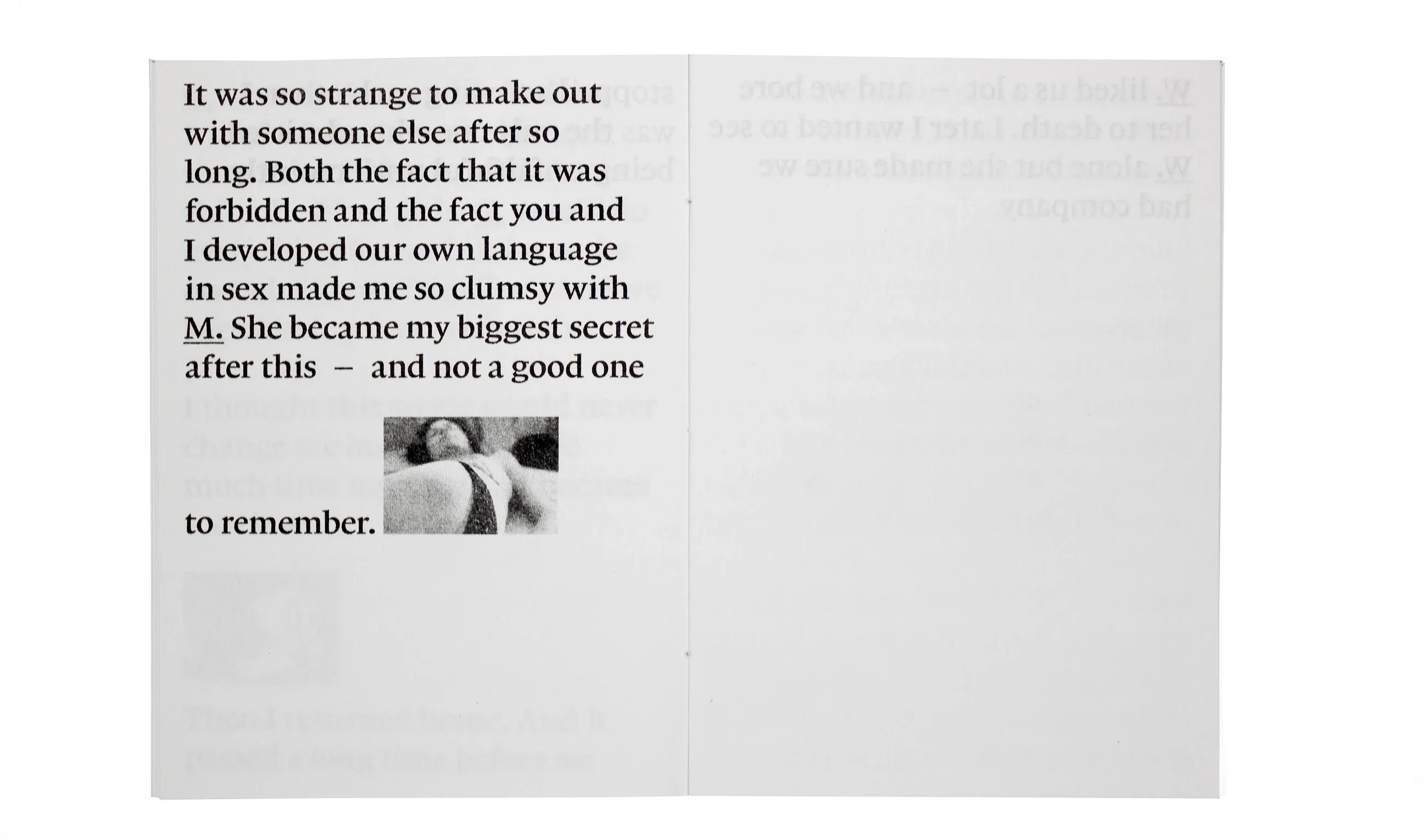 An open spread with a paragraph of text and a small black-and-white photograph set into it