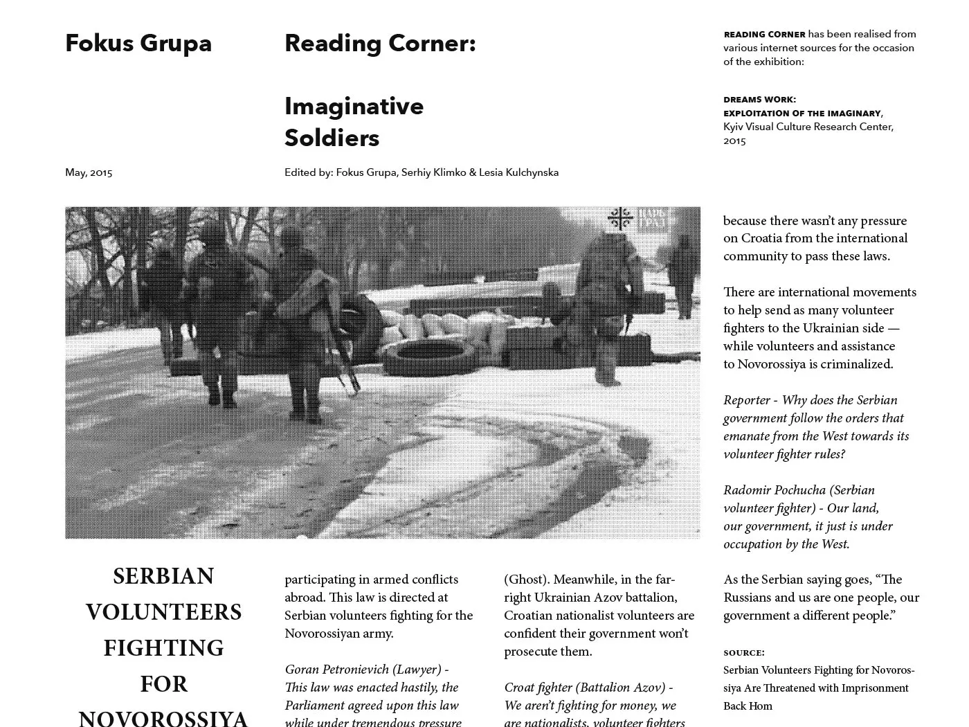 Detail of news articles pasted on monument replica