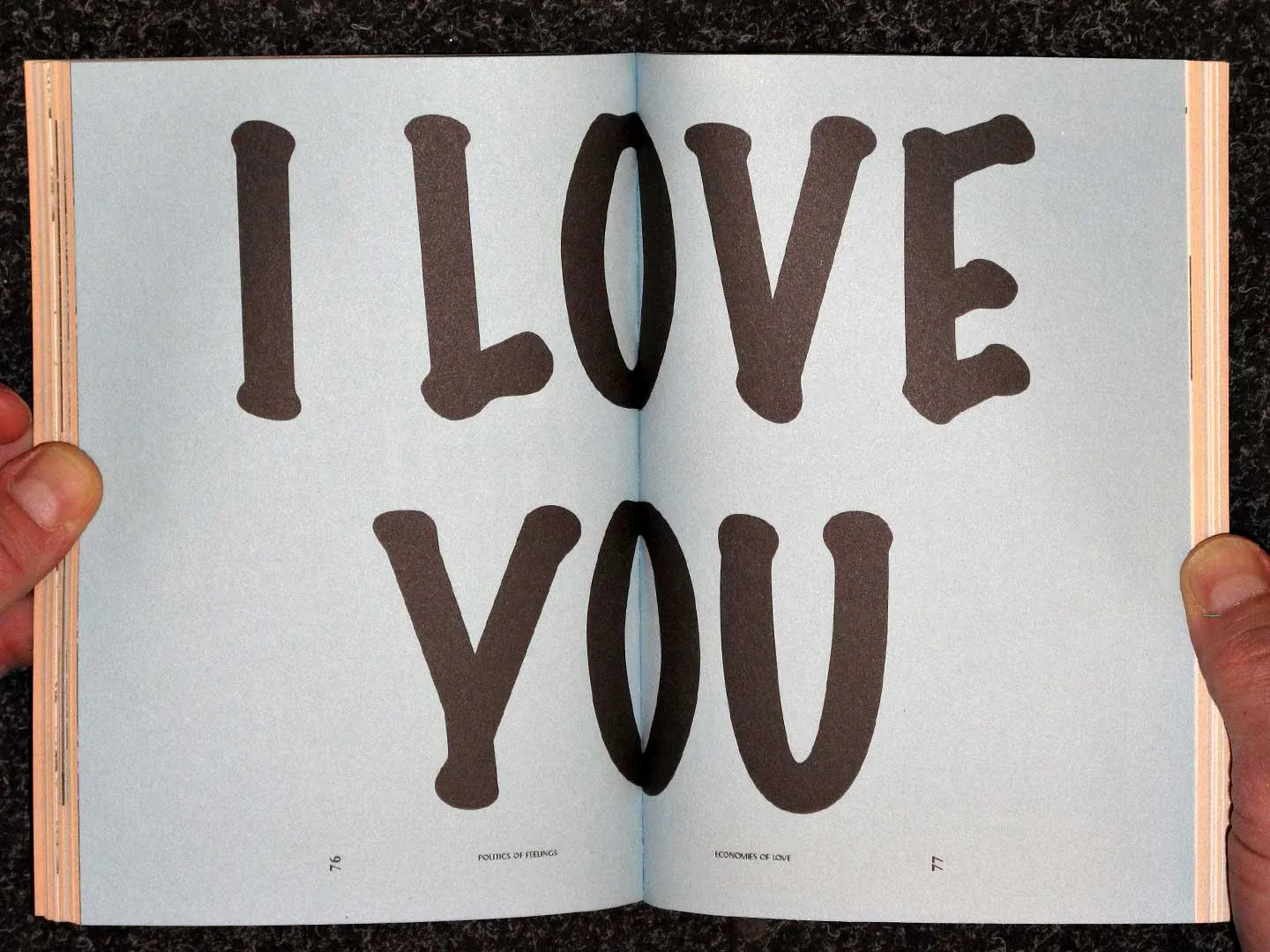 A spread with the words "I love you" in large hand-drawn letters