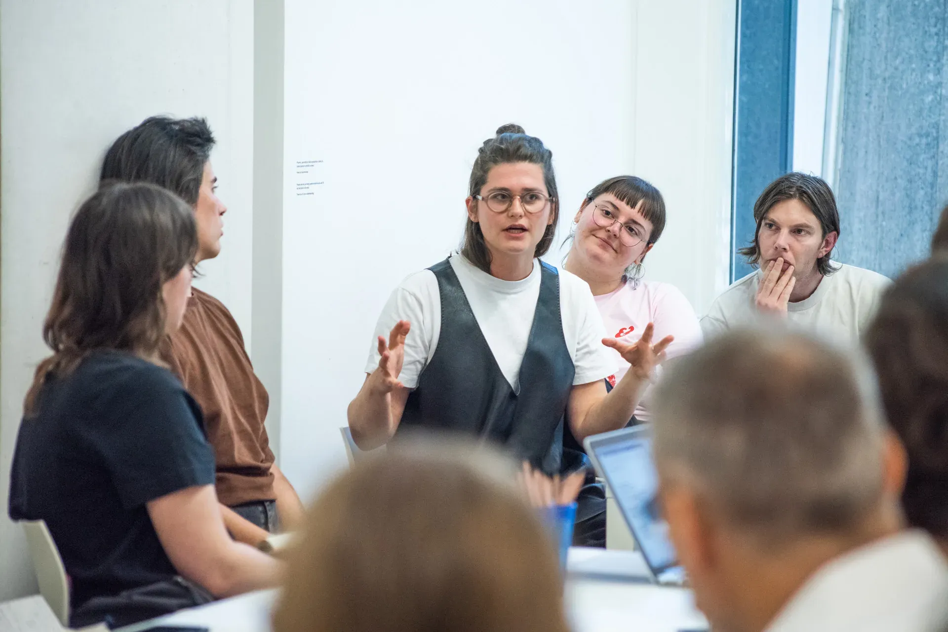 A participant presenting a case study at the table