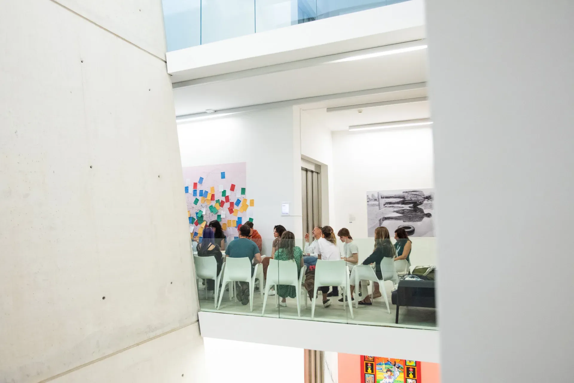 The workshop seen through the concrete architecture of the museum